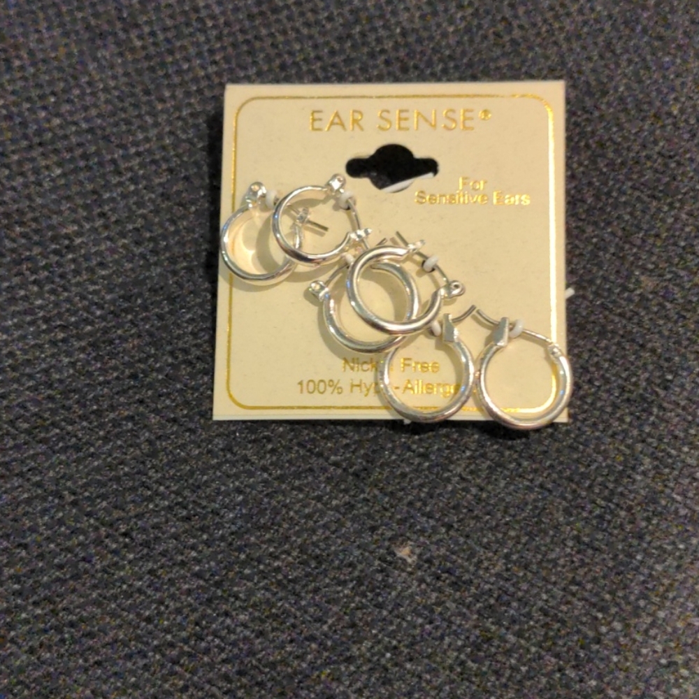 Three pair of silver hoops